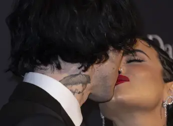 February 4, 2023, Beverly Hills, California, USA: Jordan Lutes Jutes and Demi Lovato at the 65th Pre-Grammy Gala held at