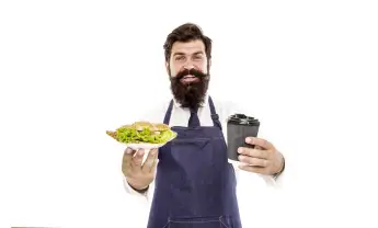 Delicious  croissant.  Enjoy  your  meal.  Guy  serving  croissant  stuffed  lettuce  and  fresh  ve