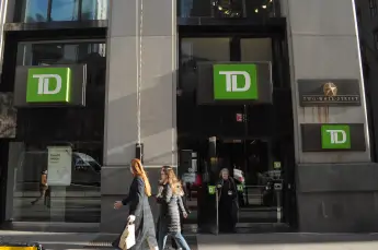 Daily Life in Wall Street and the Financial District, New York City, USA - 04 Jan 2024 A customer walks out of a TD Bank