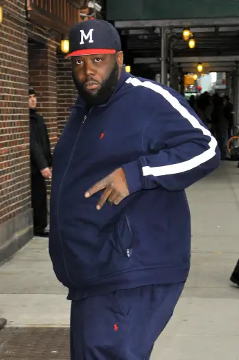 Rapper Killer Mike flashes the peace sign as he arrives for an appearance on the Late Show with David Letterman 92715, N