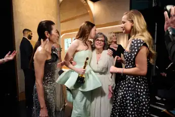 96th Oscars, Academy Awards Emma Stone backstage with Sally Field, Jennifer Lawrence, Charlize Theron, Michelle Yeoh, an