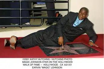 2001 KATHY HUTCHINS / HUTCHINS PHOTO.MAGIC JOHNSON STAR ON THE HOLLYWOOD.WALK OF FAME -- HOLLYWOOD , CA 6/21/01.EARVIN M