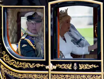 State Opening of Parliament King Charles III and Queen Camilla depart Buckingham Palace in the Diamond Jubilee State Coa