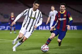 FC Barcelona, Barca v Juventus FC: Group G - UEFA Champions League Cristiano Ronaldo (L) of Juventus FC is challenged b