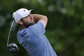 LOUISVILLE, KY - MAY 13: Scottie Scheffler (USA) plays a shot during a practice round prior to the 2024 PGA, Golf Herren