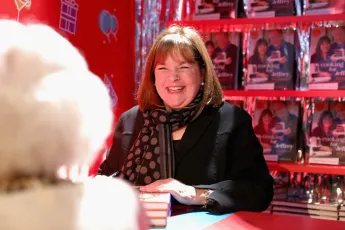 Ina Garten signs cookbooks during Food Network's 25th Birthday Party Celebration at the 11th annual New York City Wine & Food Festival, October 13, 2018.