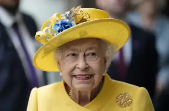 Queen Elizabeth II in a yellow suit