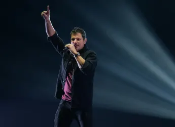 HOLLYWOOD FL - JANUARY 22: Nick Lachey of 98 Degrees performs at Hard Rock Live held at the Seminole Hard Rock Hotel & C