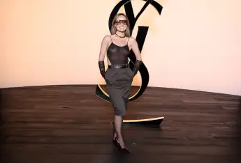 Olivia Wilde in a transparent top at Paris Fashion Week