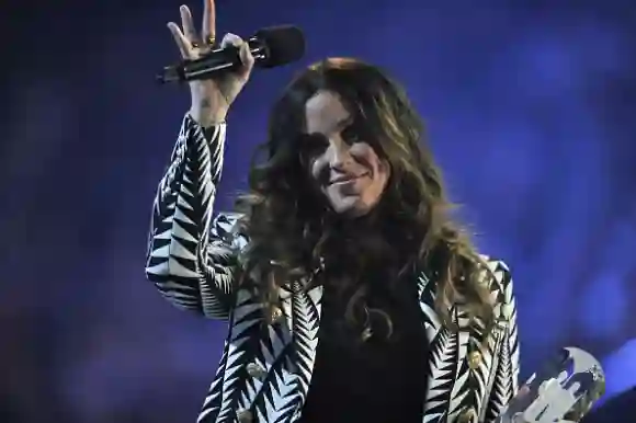 HAMILTON, ON - MARCH 15: Alanis Morissette is presented an award at the 2015 JUNO Awards at FirstOntario Center on March 15, 2015 in Hamilton, Canada. (Photo by Sonia Recchia/Getty Images)