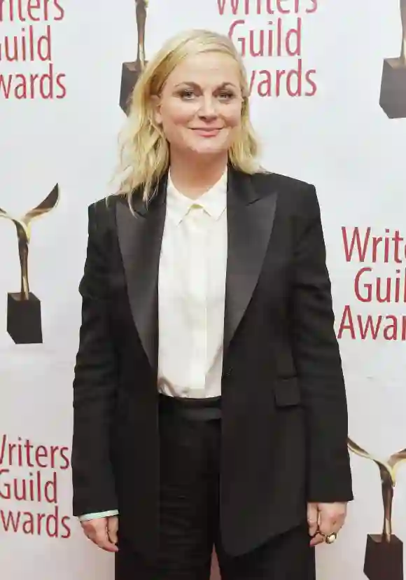 Amy Poehler poses backstage at the 72nd Writers Guild Awards.