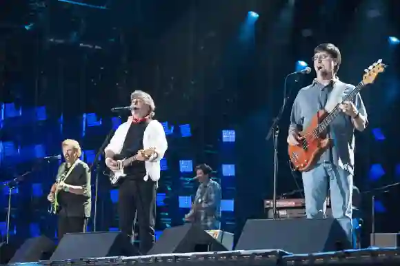 Teddy Gentry, Randy Owen, and Jeff Cook of the music group Alabama performing at the 2014 CMA Music Festival