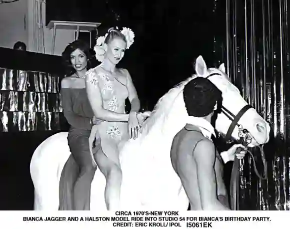 BIANCA JAGGER AND A HALSTON MODEL RIDE INTO STUDIO 54 FOR BIANCA S BIRTHDAY PARTY 1970