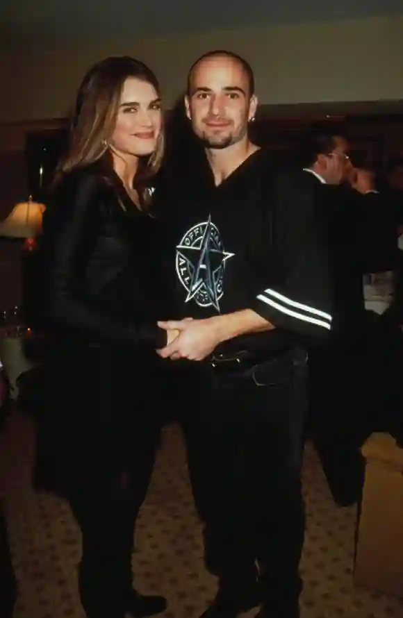 Dec 29 2009 ANDRE AGASSI WITH BROOKE SHIELDS AT ALL STAR CAFE OPENS IN TIME SQUARE NEW YORK CI