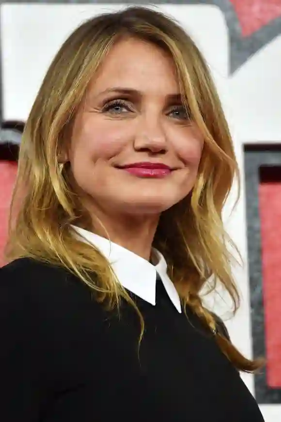 Cameron Diaz poses for pictures during a photocall for the film "Annie"