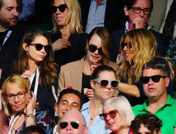 Mandatory Credit: Photo by Javier Garcia/Shutterstock (14003748ke) Minke, Cara Delevingne and Sienna Miller eating straw