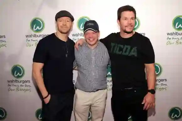 Mark, Donnie, and Paul Wahlberg at Wahlburgers Coney Island Preview Party in 2015