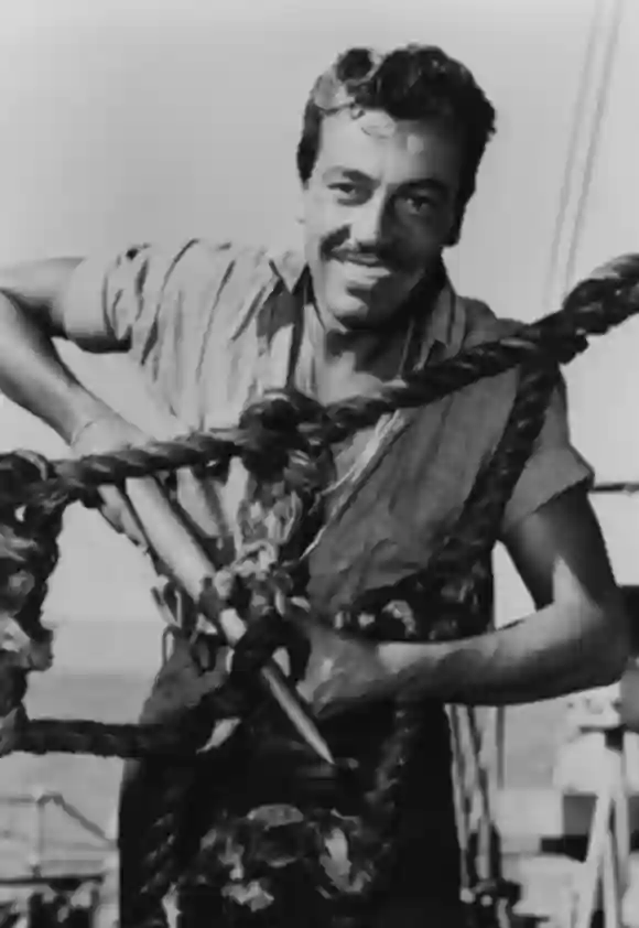 Actor Cesar Romero (The Joker) pictured working on a ship during his time in the Coast Guard Service, circa 1943.