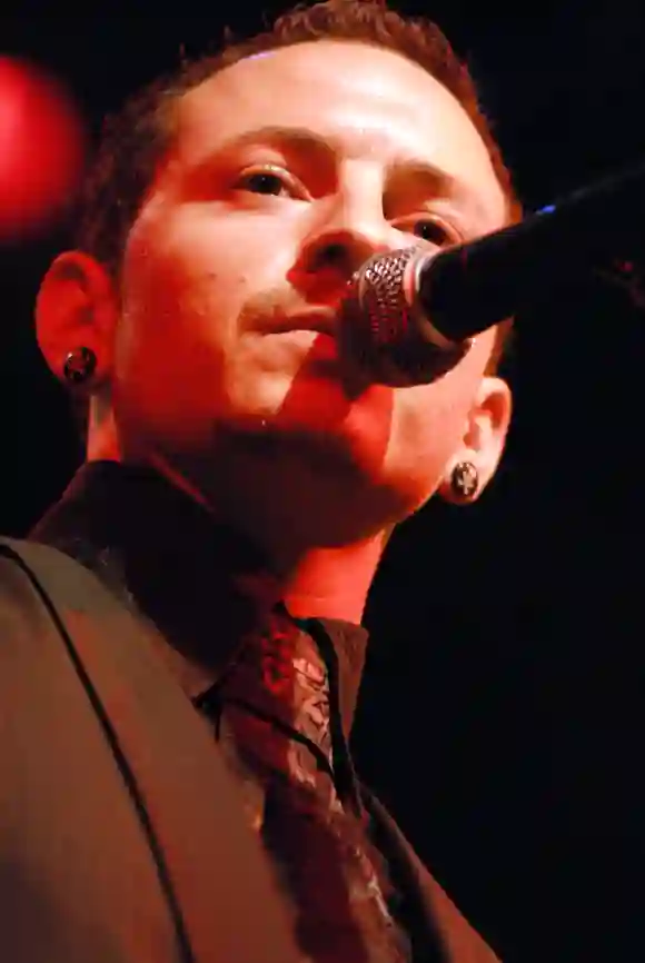 A  vertical  closeup  of  Chester  Bennington  singing  at  the  former  House  of  Blues  on  Sunse