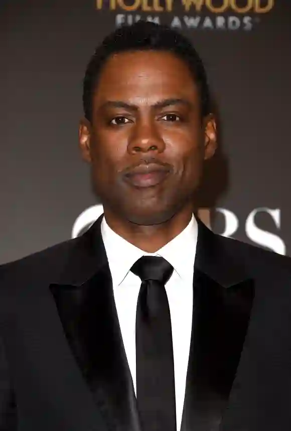 Chris Rock, winner of Hollywood Comedy Film for 'Top Five,' poses in the press room during the 18th Annual Hollywood Film Awards.