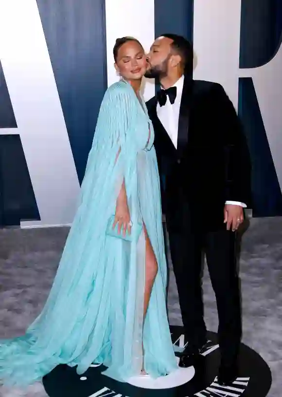Chrissy Teigen and John Legend attend the Vanity Fair Oscar Party 2020