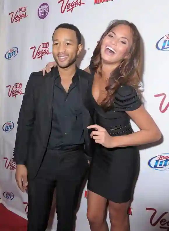 Chrissy Teigen and John Legend attend the 'Sports Illustrated Swimsuit' 24/7: New York Launch Party 2010