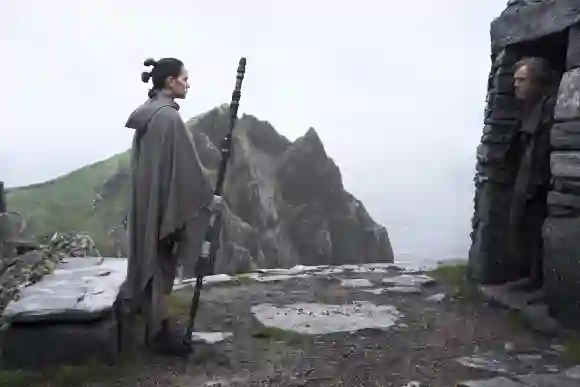 Daisy Ridley as "Rey" and Mark Hamill as "Luke Skywalker" in Star Wars: The Last Jedi (2017).