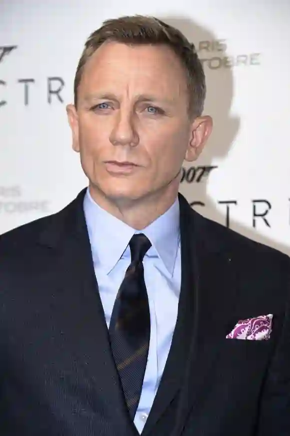 Daniel Craig poses during the French premiere of the new James Bond film 'Spectre'.