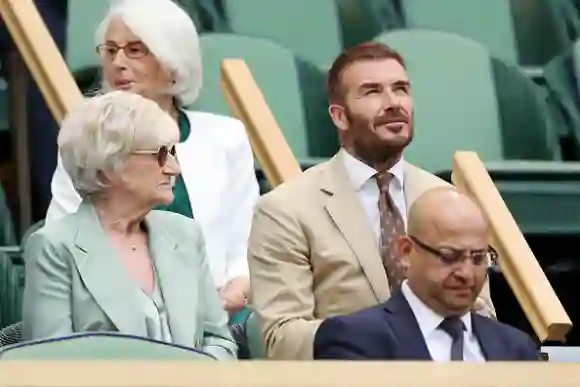LONDON, ENGLAND - JULY 05: Former footballer, David Beckham watches on with his Mother, Sandra Georgina West prior to the Women's Singles second round match between Daria Kasatkina and Jodie Burrage of Great Britain during day three of The Championships Wimbledon 2023 at All England Lawn Tennis and Croquet Club on July 05, 2023 in London, England. (Photo by Patrick Smith/Getty Images)