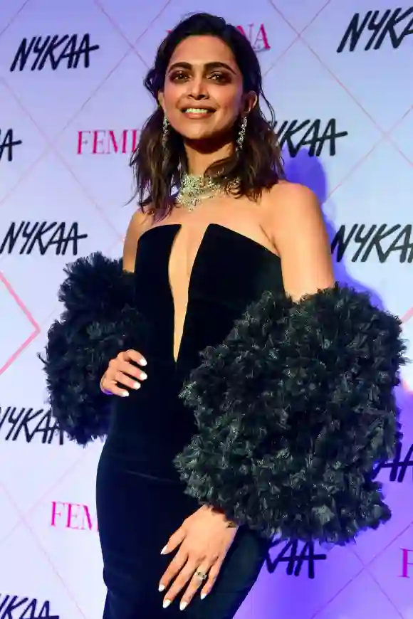 Bollywood actress Deepika Padukone poses for photographs as she arrives at the 'Nykaa Femina Beauty Awards 2020' in Mumbai.