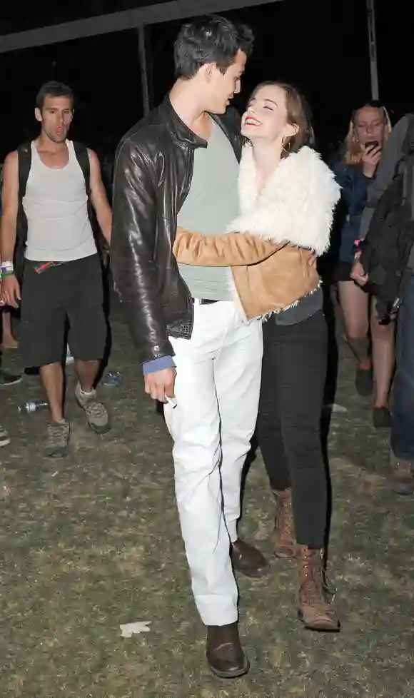 **EXCLUSIVE** LOVED UP !! Emma Watson is seen getting cosy with her new boyfriend Will Adamowicz at the Coachella festiv