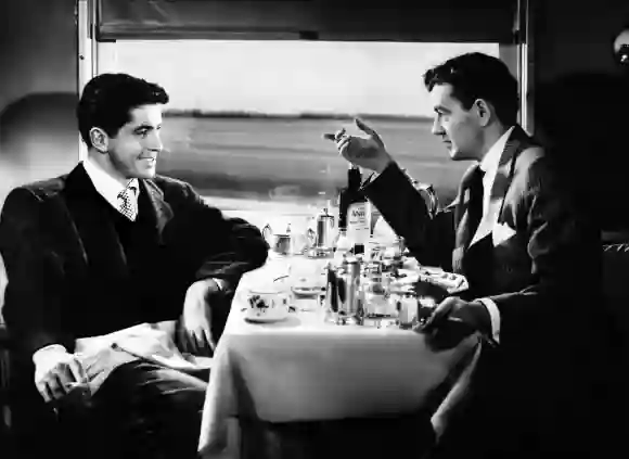 Actors Farley Granger and Robert Walker in director Alfred Hitchcock's ﻿movie Strangers On A Train﻿ (1951).