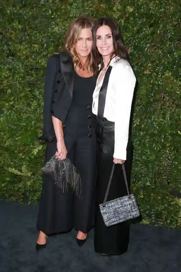 Jennifer Aniston and Courtney Cox at the CHANEL Dinner celebrating the Our Majestic Oceans Benefit.