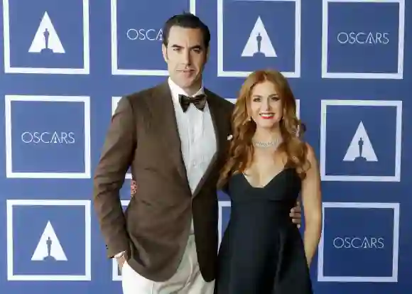 Sacha Baron Cohen and Isla Fisher attend a screening of the Oscars