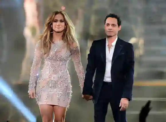 Jennifer Lopez and singer Marc Anthony appear during the finale of the Q'Viva! The Chosen Live show at the Mandalay Bay Events Center