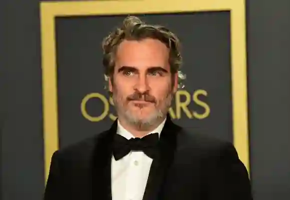 Joaquin Phoenix poses in the press room with the Oscar for Best Actor for "Joker" during the 92nd Oscars.