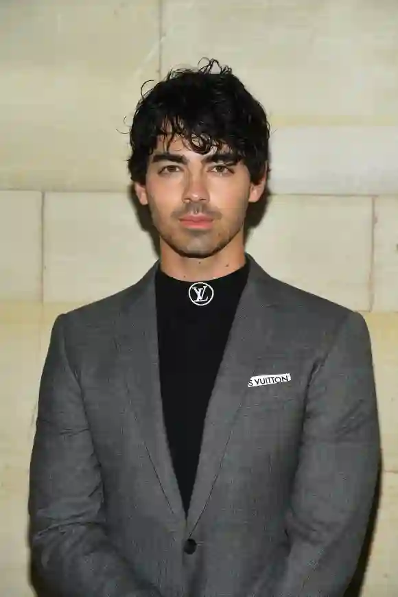 Joe Jonas attends the Louis Vuitton show as part of the Paris Fashion Week Womenswear Spring/Summer 2019