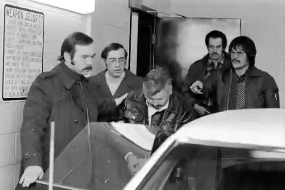 John Wayne Gacy, 36, is removed from the Des Plaines Police Station en route to a hospital on Dec. 23, 1978