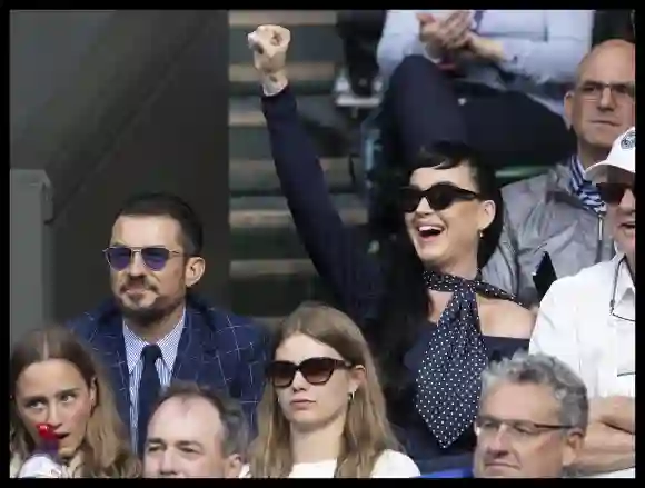 . 05/07/2023. London, United Kingdom. Orlando Bloom and Katy Perry watch the tennis on Centre Court on day three of the