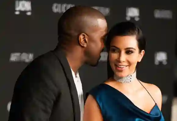 Kim Kardashian and her husband, recording artist Kanye West, arrive for the 2014 LACMA Art + Film Gala honoring film director Quentin Tarantino.