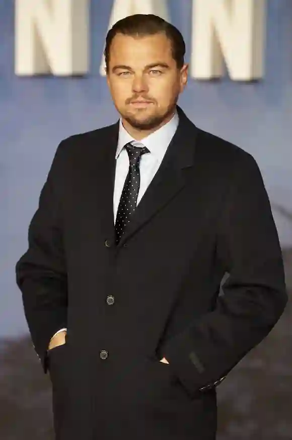 Leonardo DiCaprio poses on arrival for the premiere of the film 'The Revenant'.