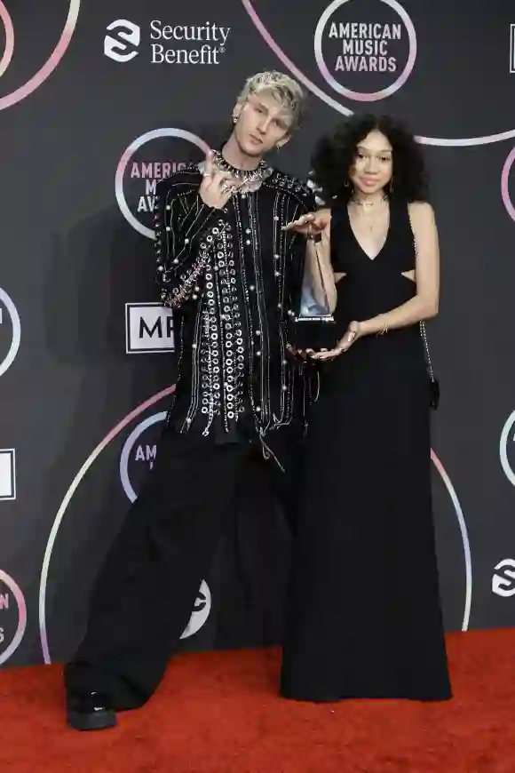 Machine Gun Kelly, winner of the Favorite Rock Artist award, poses with Casie Colson Baker in the Press Room at the 2021 American Music Awards