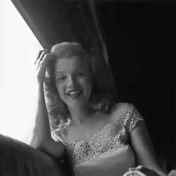 American actress Marilyn Monroe (1926 - 1962) riding on a train from New York City to Warrensburg, New York in June 1949