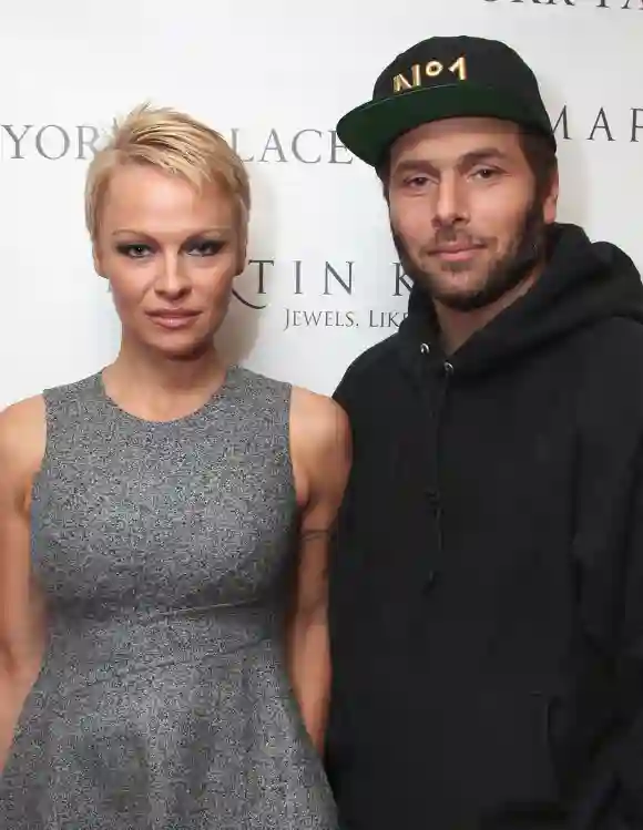 Pamela Anderson and Rick Salomon attend The Martin Katz Jewel Suite Debuts At The New York Palace Hotel.