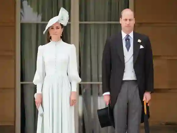 Prince William Kate Middleton royal garden party Buckingham Palace rain hats photos pictures 2022 Prince Edward Sophie Wessex