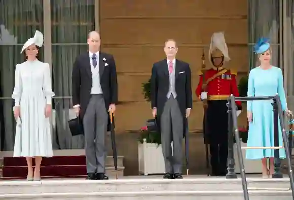 Prince William Kate Middleton royal garden party Buckingham Palace rain hats photos pictures 2022 Prince Edward Sophie Wessex