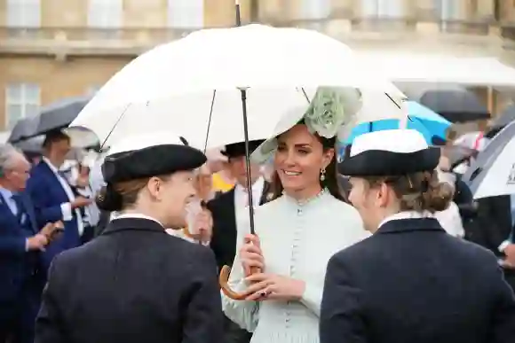 Prince William Kate Middleton royal garden party Buckingham Palace rain hats photos pictures 2022 Prince Edward Sophie Wessex