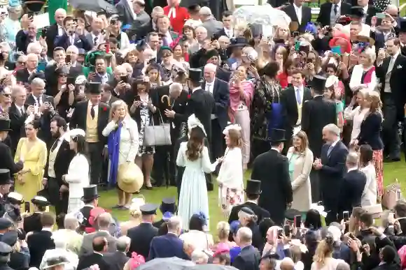 Prince William Kate Middleton royal garden party Buckingham Palace rain hats photos pictures 2022 Prince Edward Sophie Wessex