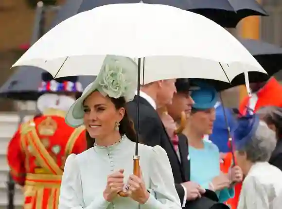 Prince William Kate Middleton royal garden party Buckingham Palace rain hats photos pictures 2022 Prince Edward Sophie Wessex