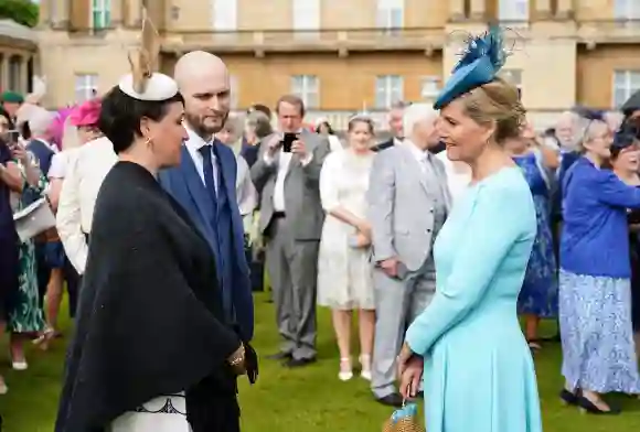 Prince William Kate Middleton royal garden party Buckingham Palace rain hats photos pictures 2022 Prince Edward Sophie Wessex